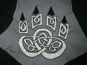 Wolf Paw Print Embroidery done in Double Running Stitch and Brick Stitch. 